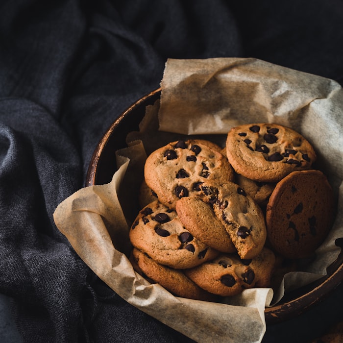 A bowl of chocolate chip cookies, warm from the oven