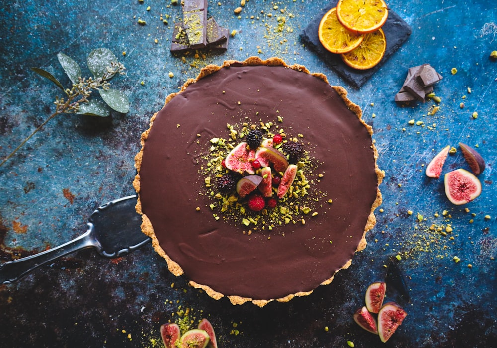 A whole chocolate cookie pie, sliced and ready to share